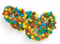 Milk chocolate pretzels covered in mini M&M’s
