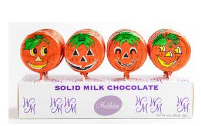 Madelaine foil wrapped jack-o-lantern pops